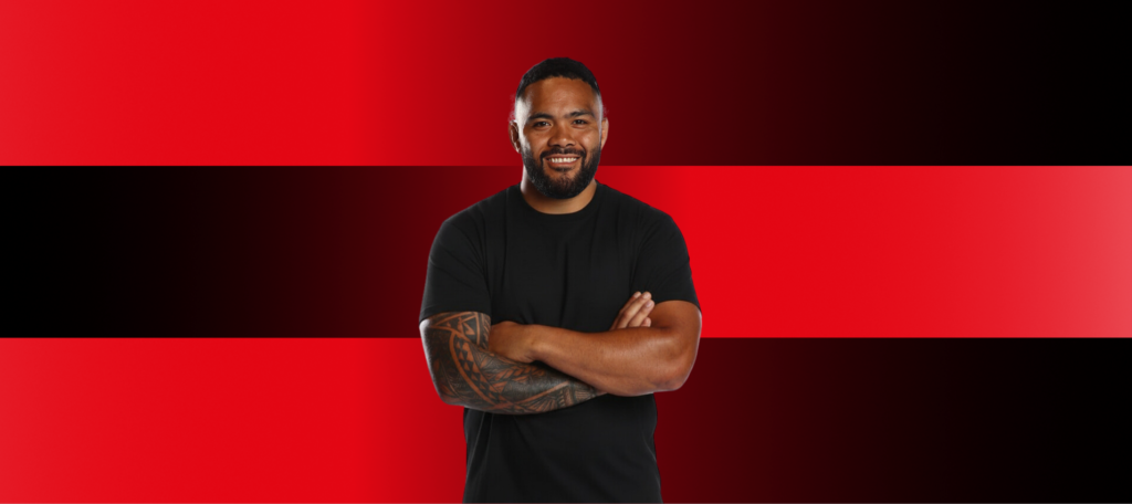 Image of Siosifa Talakai against a red and black striped background